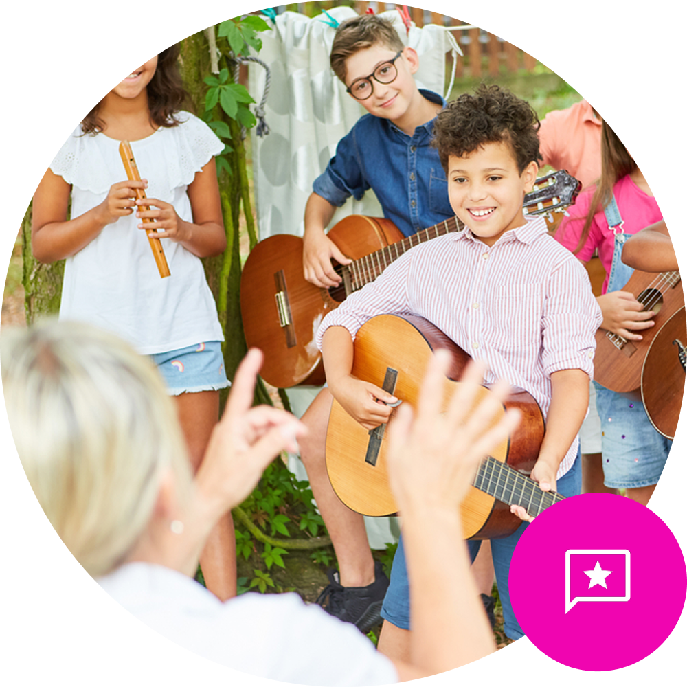 Reputation Management Featured Image – Detail Young children holding guitars in music class, looking at the teacher - Reputation / Review Icon in the bottom right on brand pink background